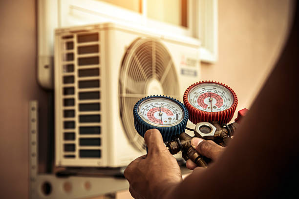 Professional Hvac technician working in West Harwich, MA